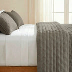 Plain quilted Taupe bedspread with a soft feel