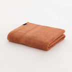 Toalla 100% algodón peinado 650 gr. Burnt Orange 1